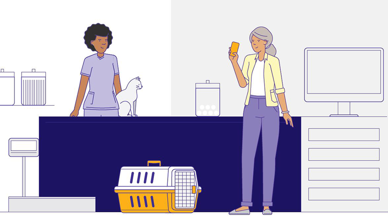 customer with phone in hand talking to vet tech