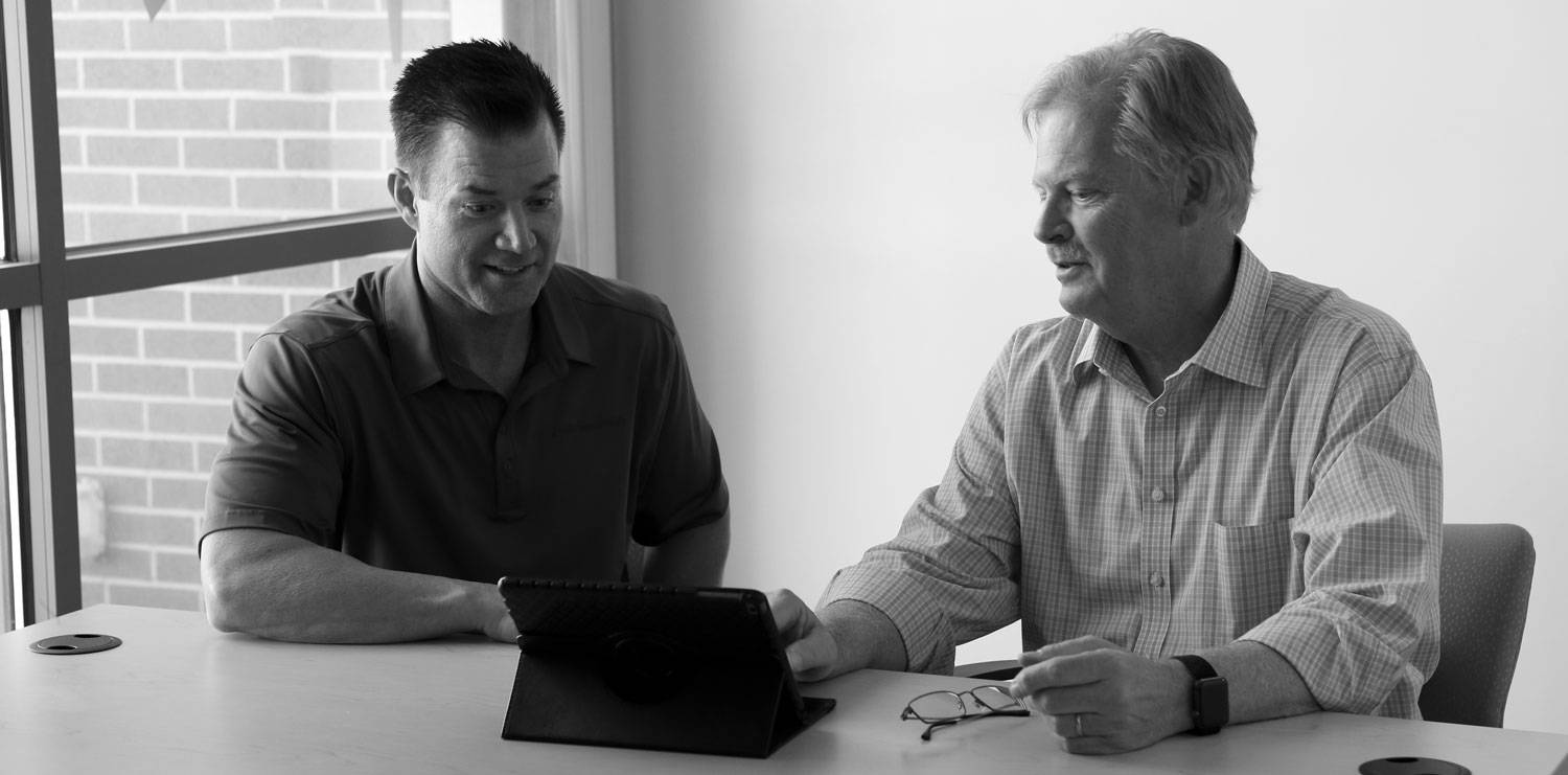 Buying group rep working with practice manager