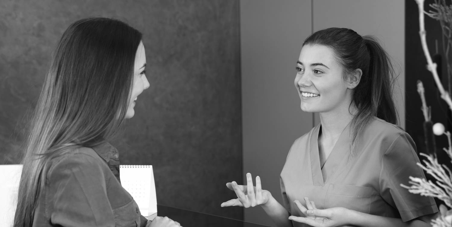 Customer relationship. Discussion front desk black and white