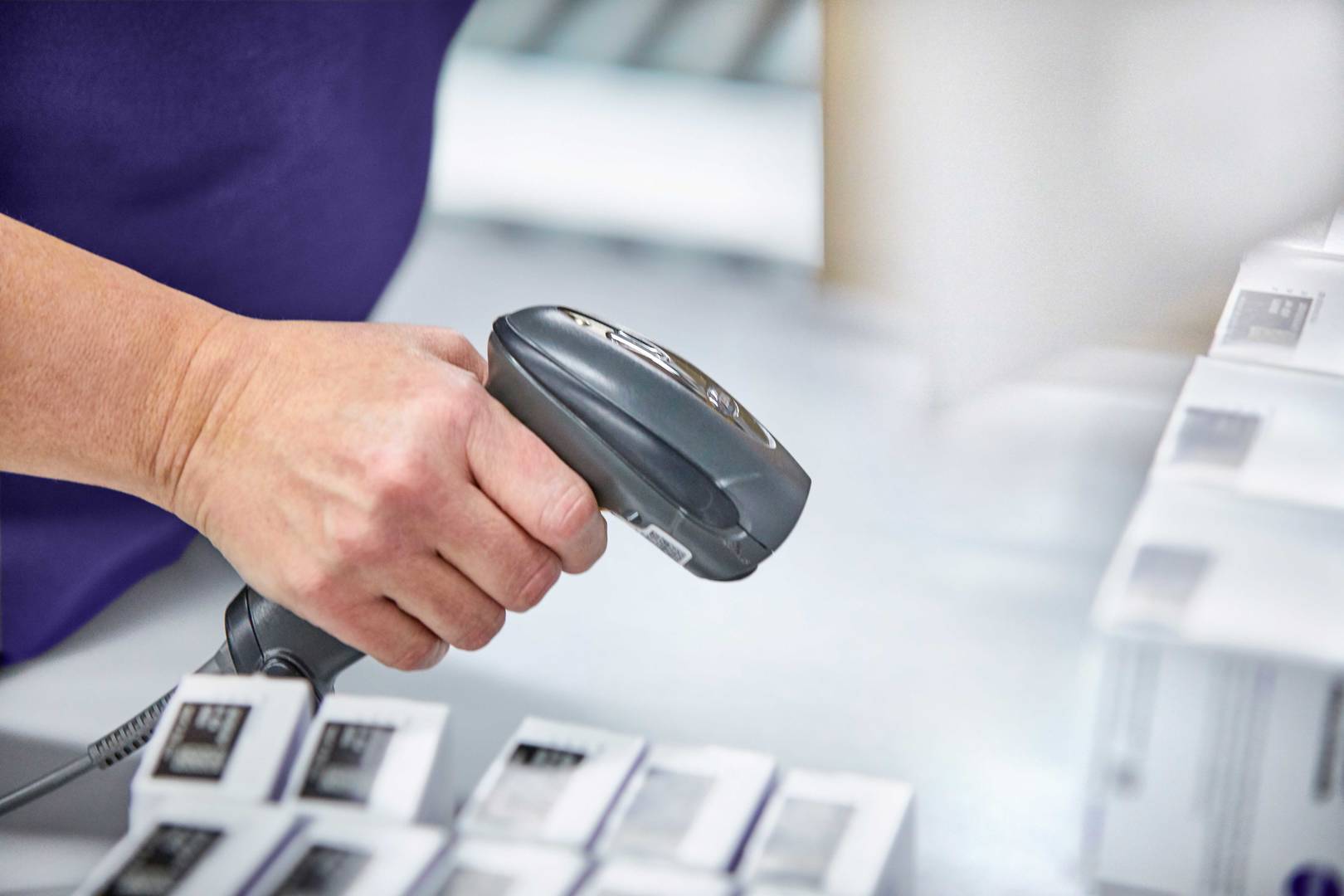 Products being scanned in a specialty distribution center