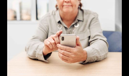 woman using her phone